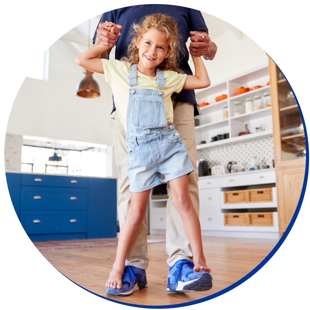 Child on father's sneakers walking. Dermoplast In This Together Prepared to Comfort & Care badge on image.